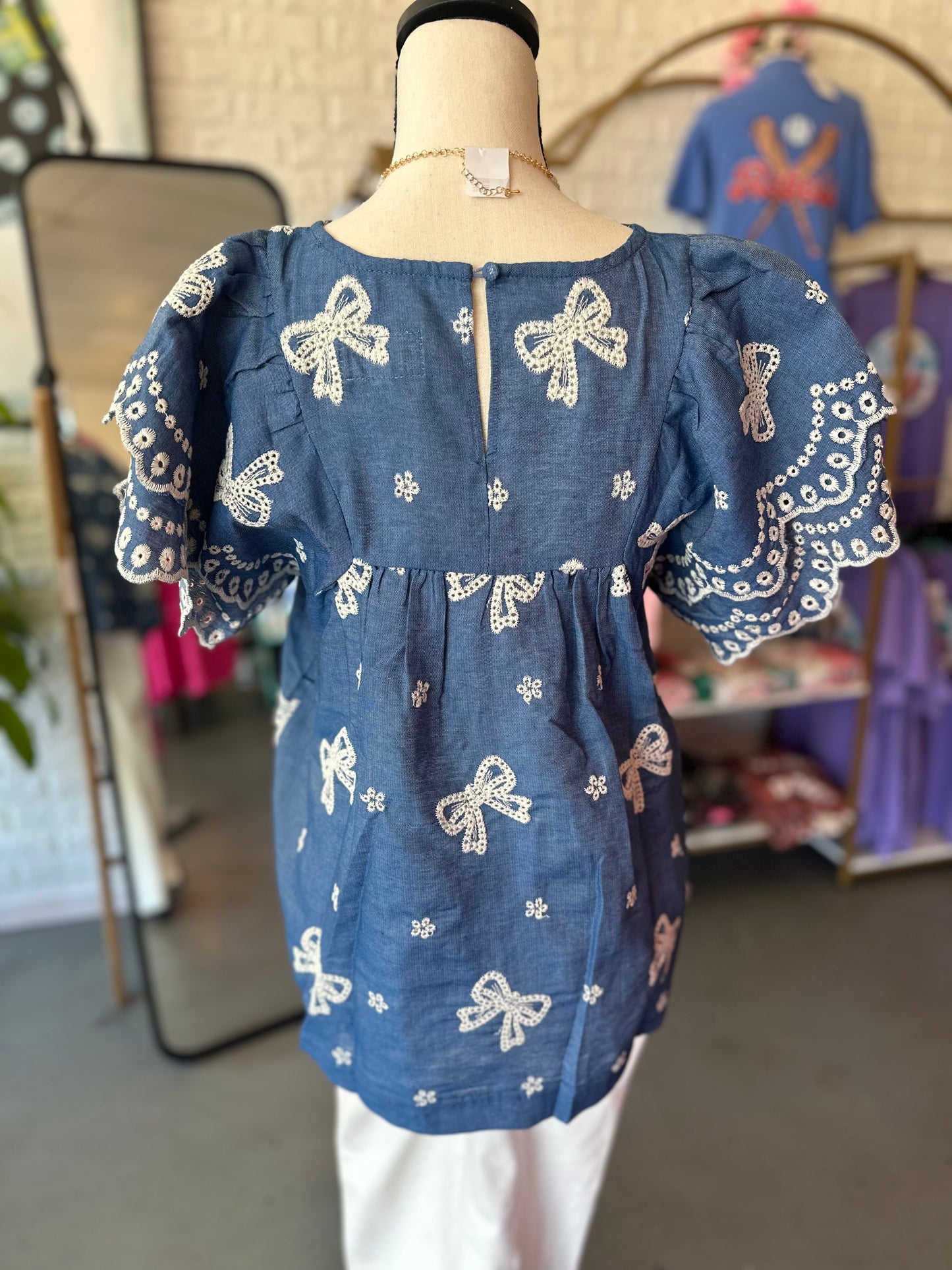Denim bow print top