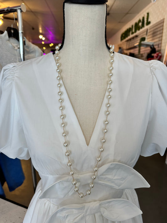 Long pearl and gold necklace